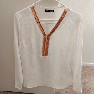 Cream long-sleeved blouse